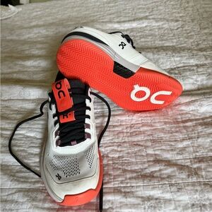 On Running Black and Red Sneakers